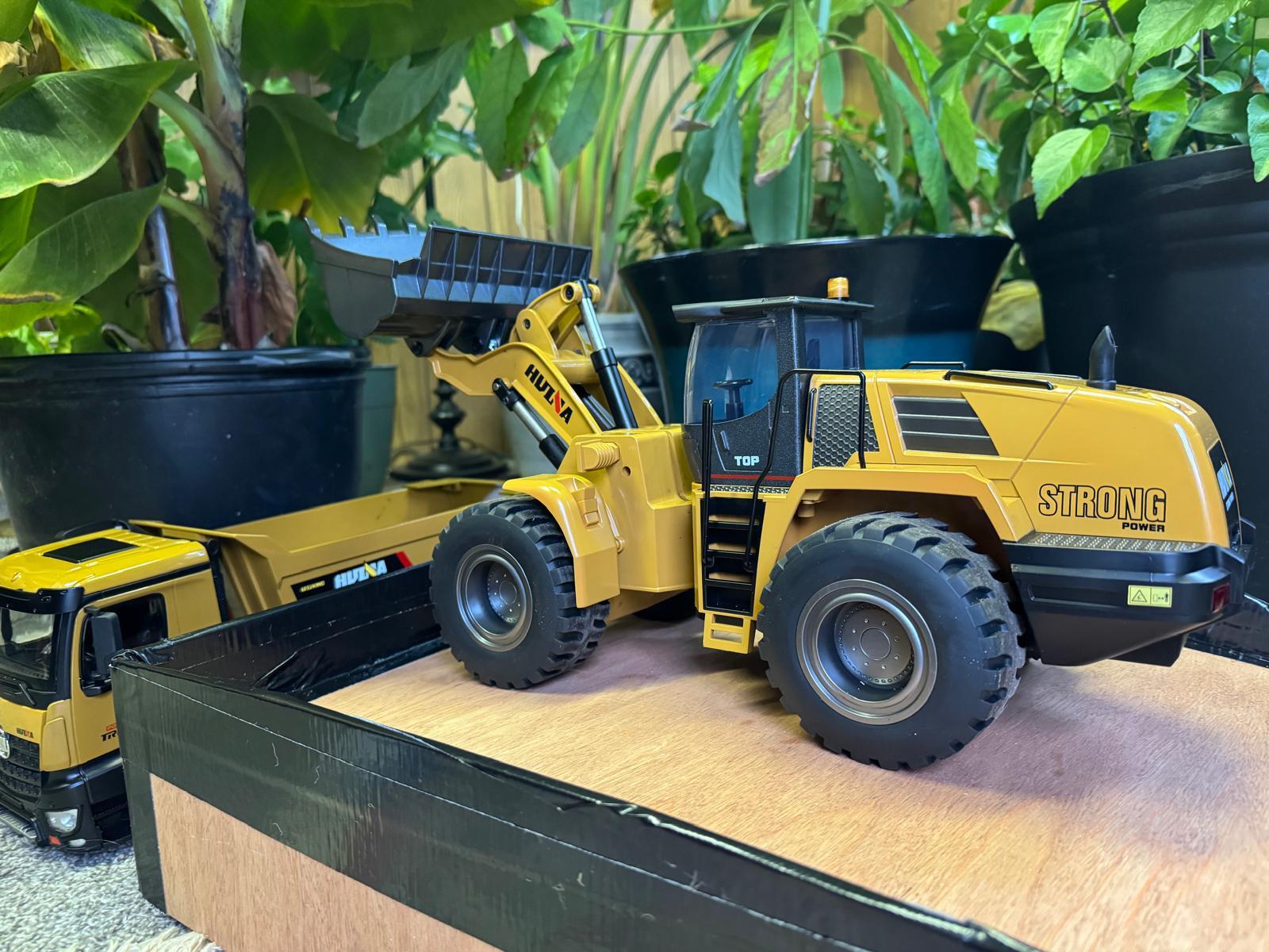 Adults having fun with RC Diggers
